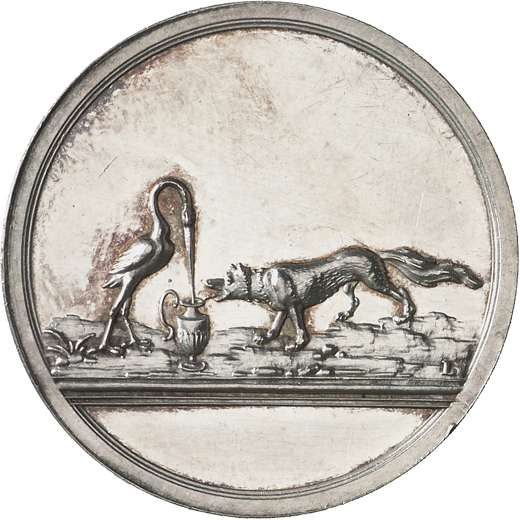 Münzevorderseite zeigt einen Storch der links vor einem Krug steht, rechts daneben ein Fuchs. Rechts über Abschnitt die Signatur L der Medaillenfirma